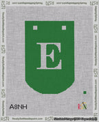 A taped needlepoint canvas with the design: Banner 18 mesh count Curved E White on Green.