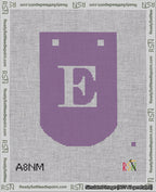 A taped needlepoint canvas with the design: Banner 18 mesh count Curved E White on Purple.
