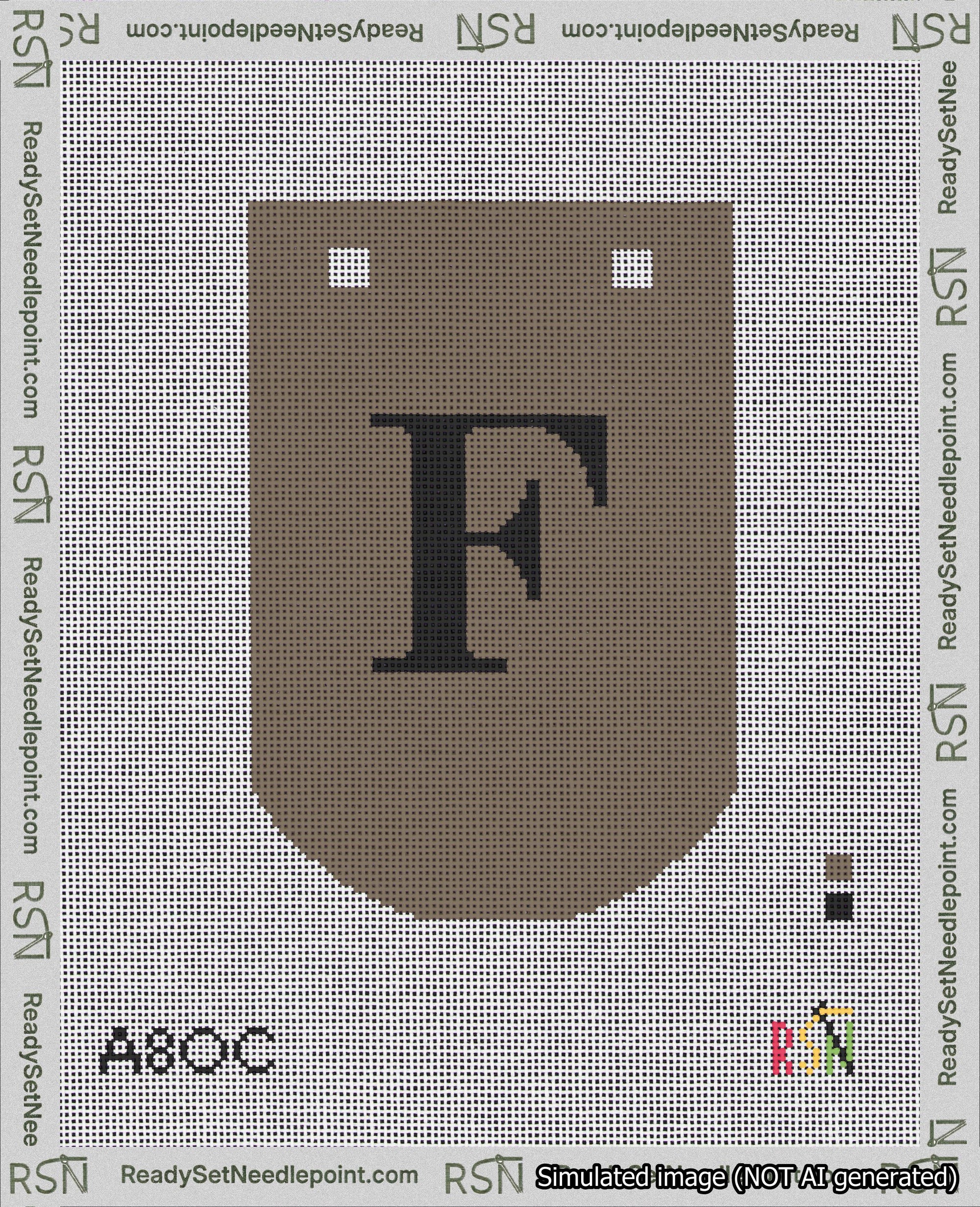 A taped needlepoint canvas with the design: Banner 18 mesh count Curved F Black on Brown.