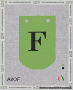 A taped needlepoint canvas with the design: Banner 18 mesh count Curved F Black on Light Green.
