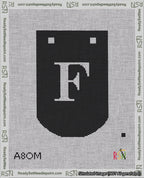 A taped needlepoint canvas with the design: Banner 18 mesh count Curved F White on Black.