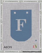 A taped needlepoint canvas with the design: Banner 18 mesh count Curved F White on Blue.