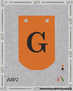A taped needlepoint canvas with the design: Banner 18 mesh count Curved G Black on Orange.