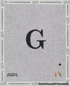 A taped needlepoint canvas with the design: Banner 18 mesh count Curved G Black on White.