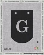A taped needlepoint canvas with the design: Banner 18 mesh count Curved G White on Black.