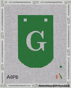 A taped needlepoint canvas with the design: Banner 18 mesh count Curved G White on Green.