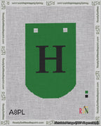 A taped needlepoint canvas with the design: Banner 18 mesh count Curved H Black on Green.