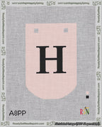 A taped needlepoint canvas with the design: Banner 18 mesh count Curved H Black on Pink.