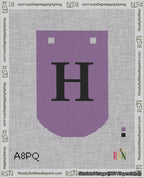 A taped needlepoint canvas with the design: Banner 18 mesh count Curved H Black on Purple.