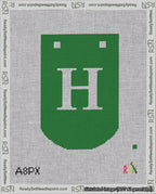 A taped needlepoint canvas with the design: Banner 18 mesh count Curved H White on Green.