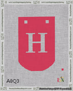 A taped needlepoint canvas with the design: Banner 18 mesh count Curved H White on Red.