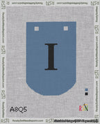 A taped needlepoint canvas with the design: Banner 18 mesh count Curved I Black on Blue.