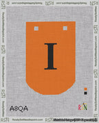 A taped needlepoint canvas with the design: Banner 18 mesh count Curved I Black on Orange.