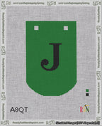 A taped needlepoint canvas with the design: Banner 18 mesh count Curved J Black on Green.