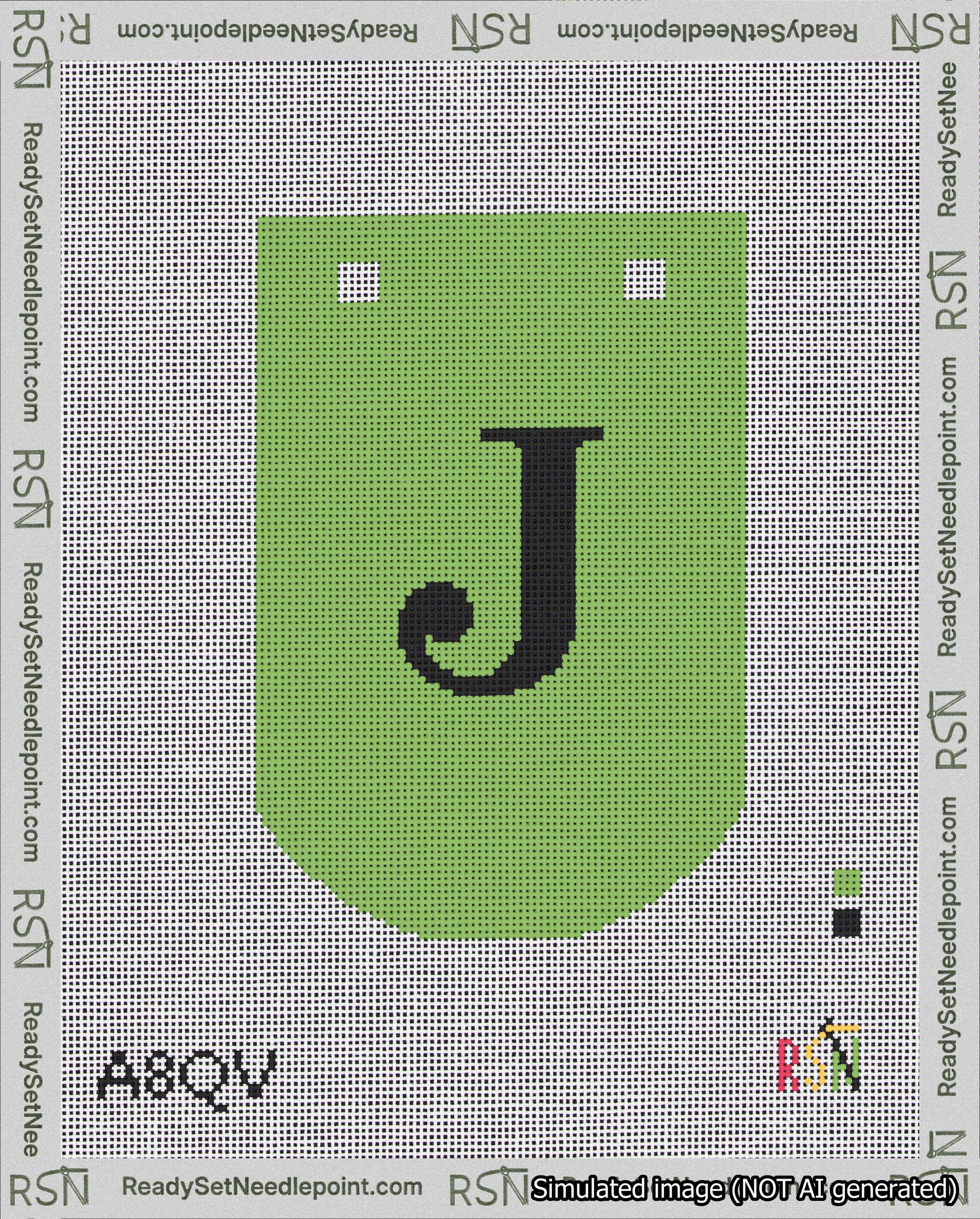 A taped needlepoint canvas with the design: Banner 18 mesh count Curved J Black on Light Green.