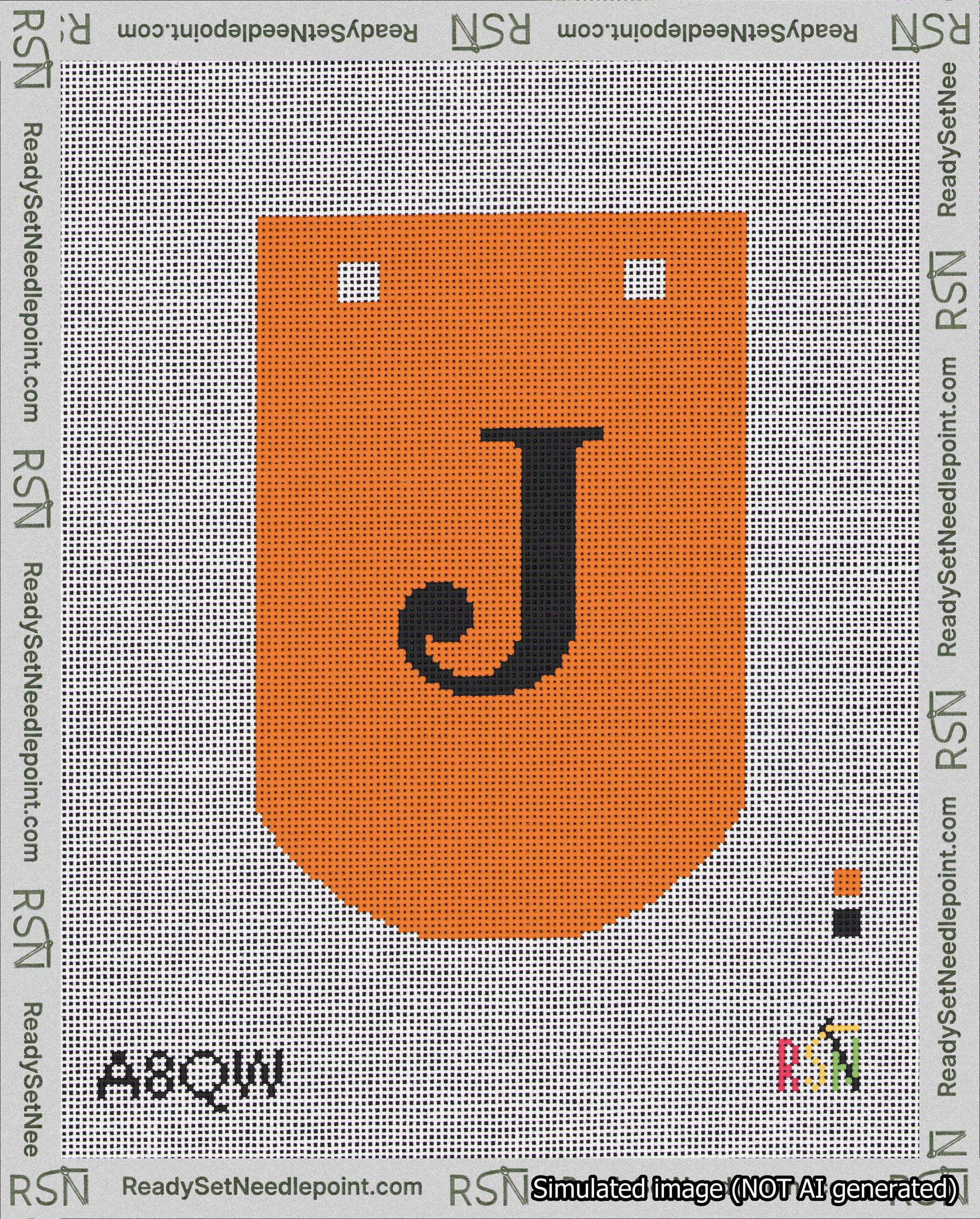 A taped needlepoint canvas with the design: Banner 18 mesh count Curved J Black on Orange.