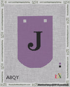 A taped needlepoint canvas with the design: Banner 18 mesh count Curved J Black on Purple.