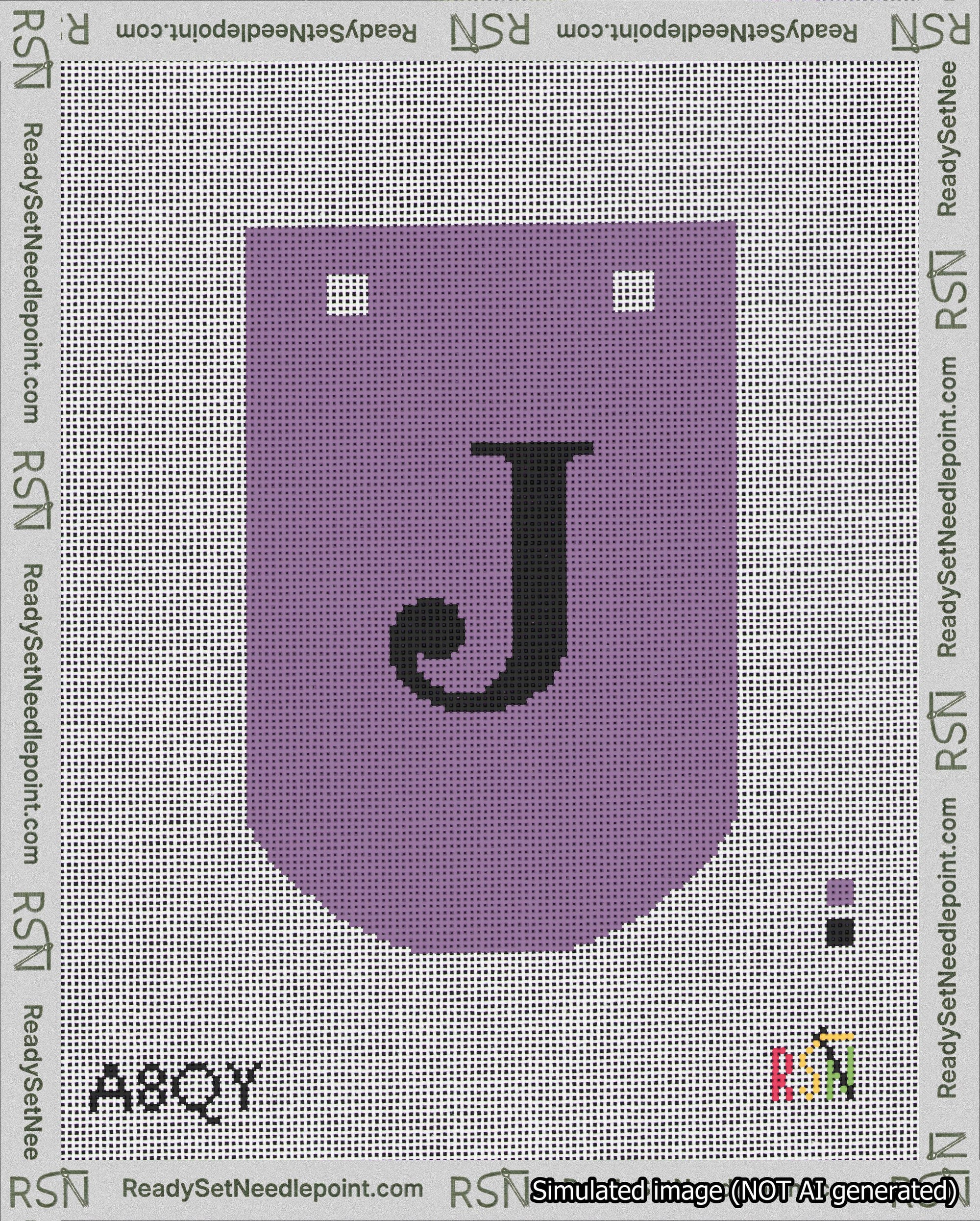 A taped needlepoint canvas with the design: Banner 18 mesh count Curved J Black on Purple.
