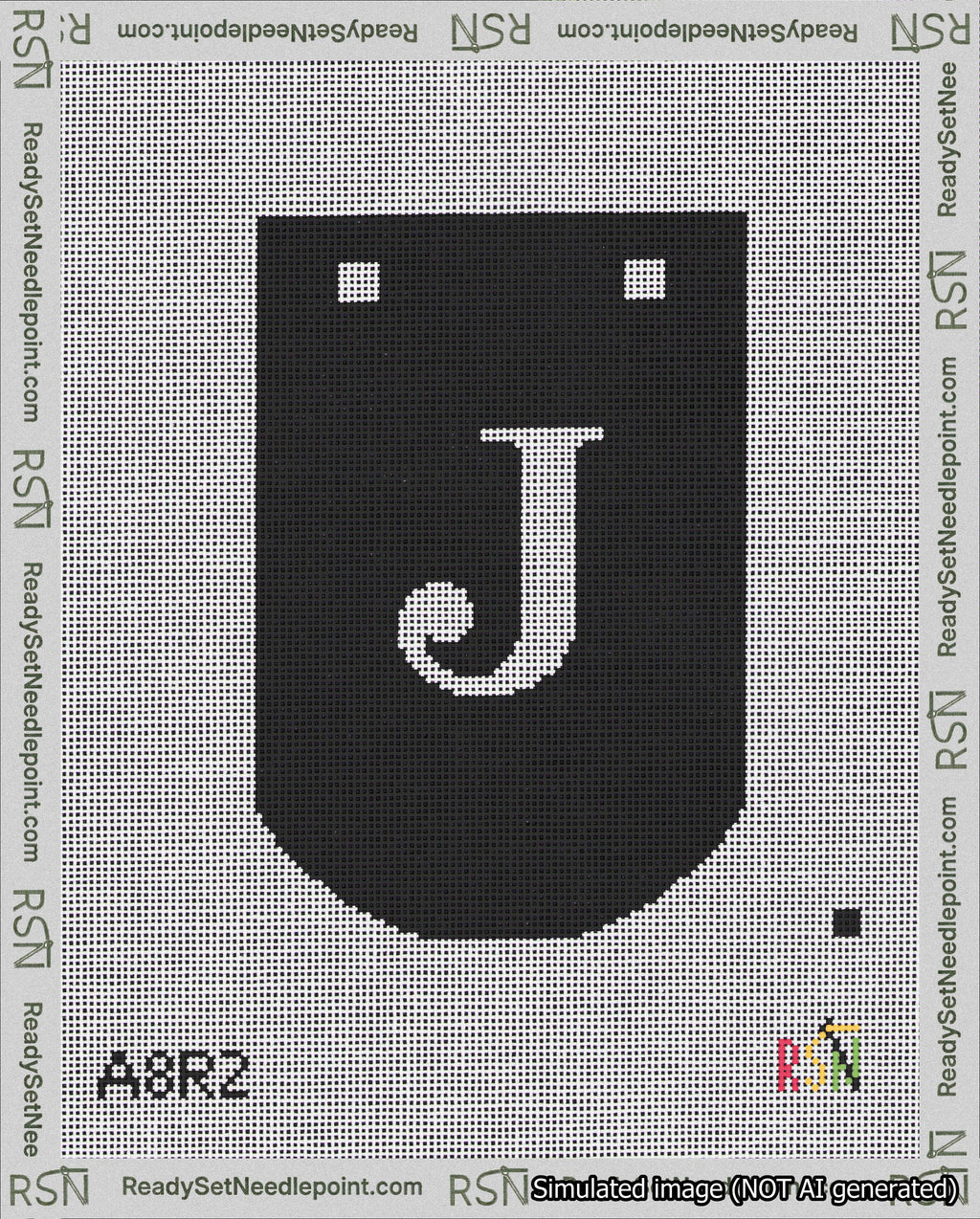 A taped needlepoint canvas with the design: Banner 18 mesh count Curved J White on Black.