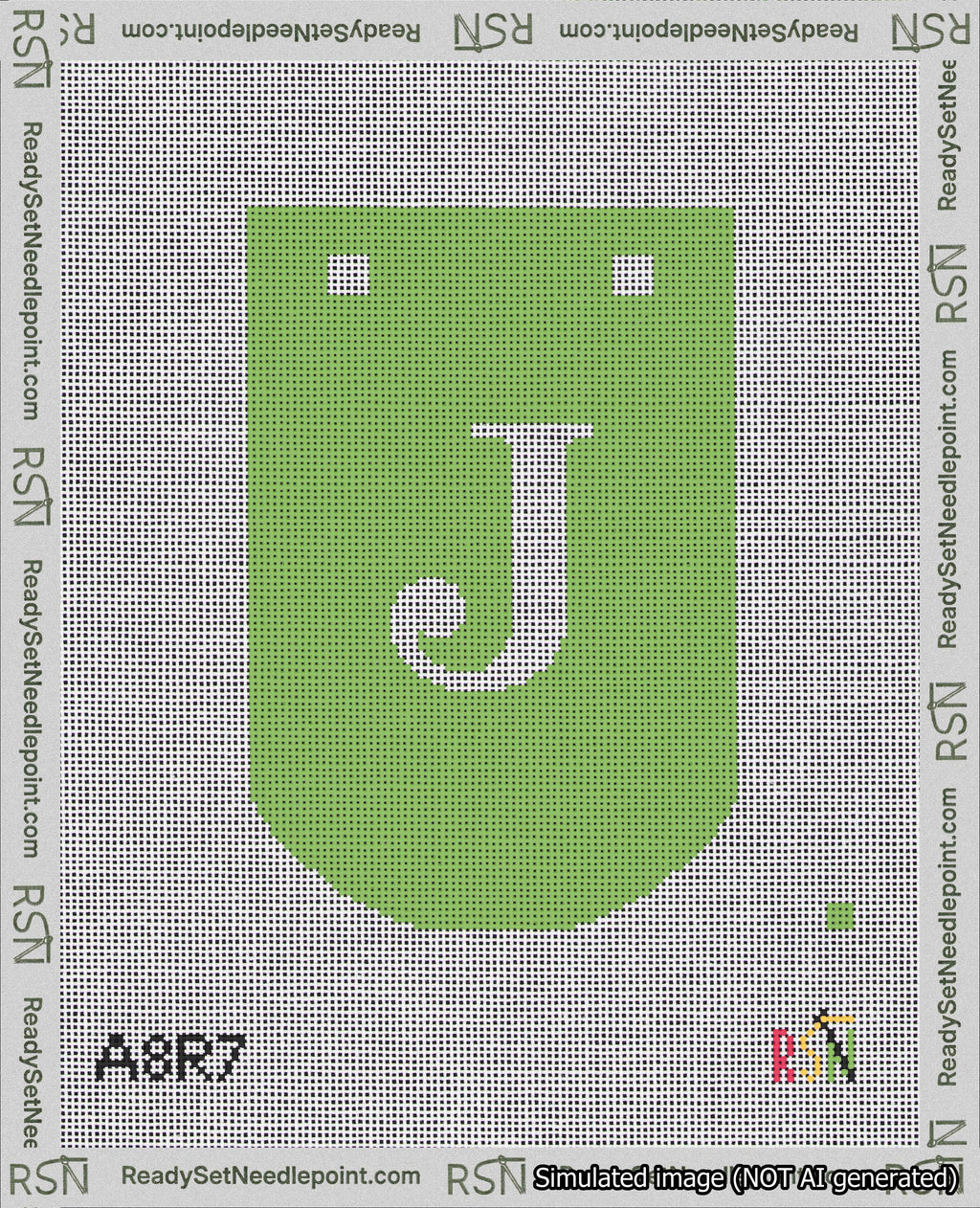 A taped needlepoint canvas with the design: Banner 18 mesh count Curved J White on Light Green.