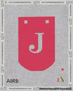 A taped needlepoint canvas with the design: Banner 18 mesh count Curved J White on Red.