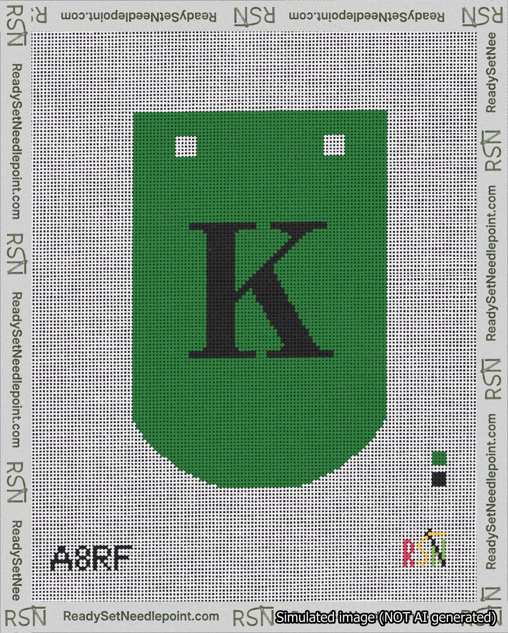 A taped needlepoint canvas with the design: Banner 18 mesh count Curved K Black on Green.