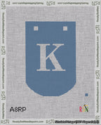 A taped needlepoint canvas with the design: Banner 18 mesh count Curved K White on Blue.