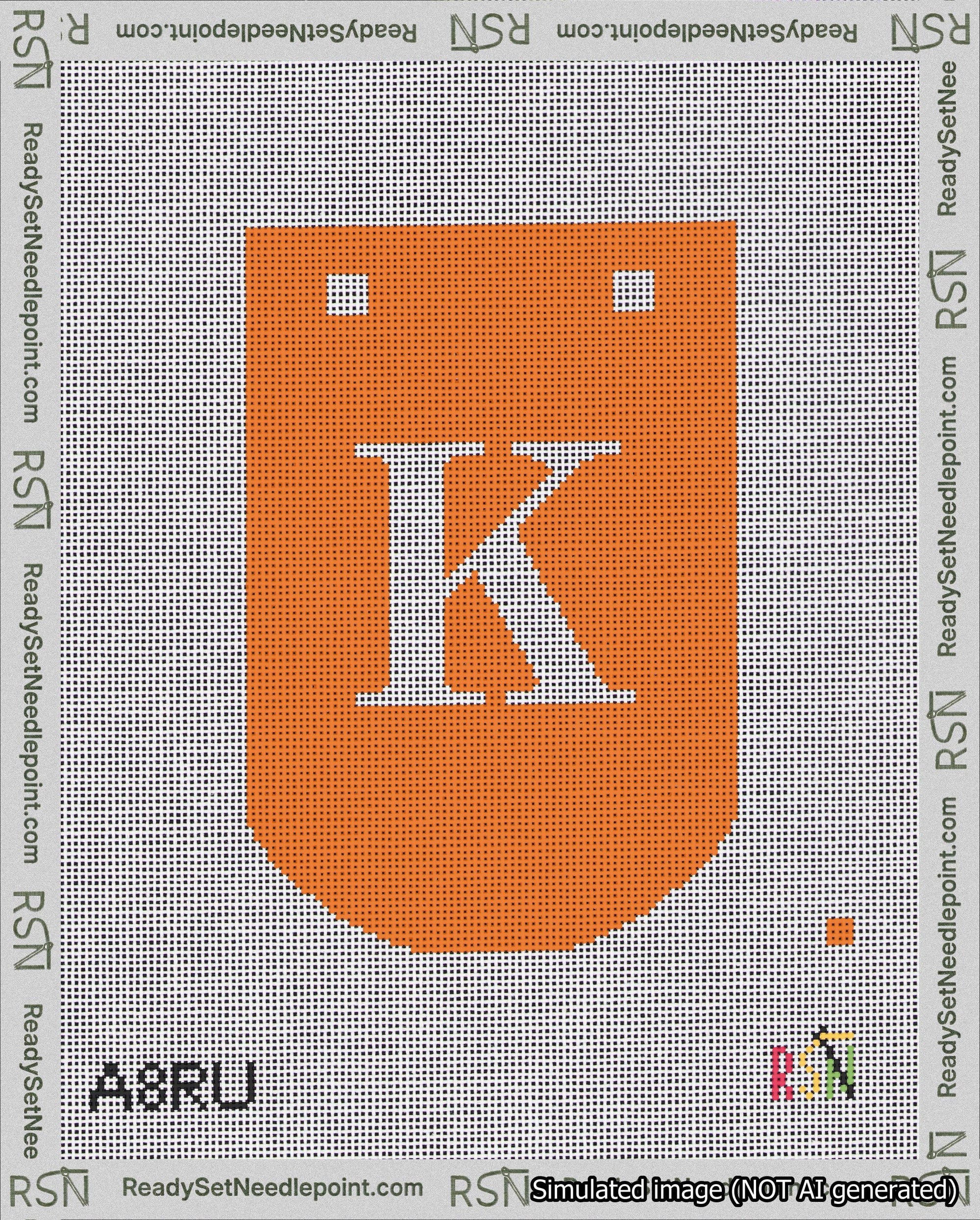 A taped needlepoint canvas with the design: Banner 18 mesh count Curved K White on Orange.