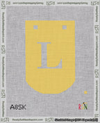 A taped needlepoint canvas with the design: Banner 18 mesh count Curved L White on Yellow.