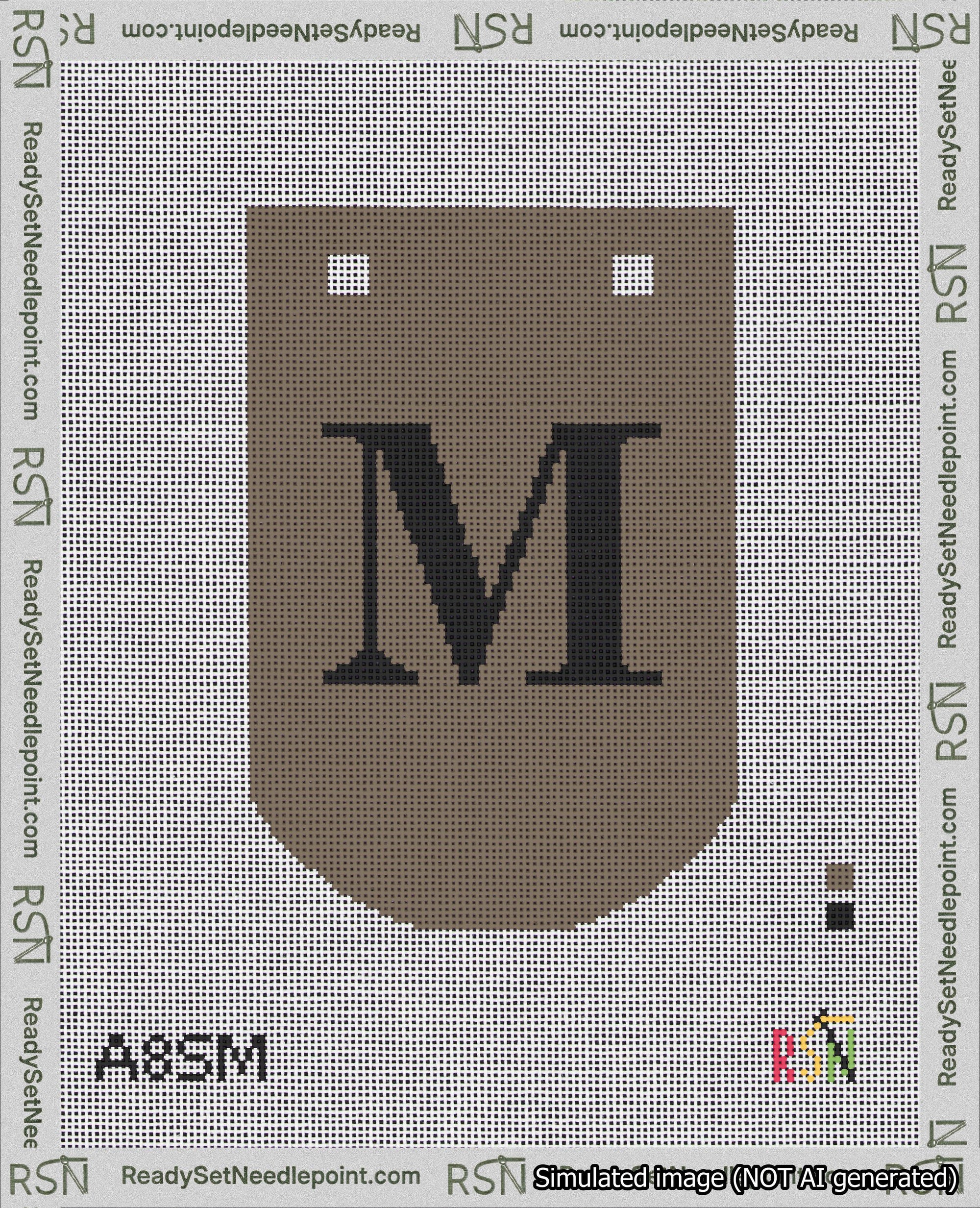 A taped needlepoint canvas with the design: Banner 18 mesh count Curved M Black on Brown.