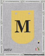 A taped needlepoint canvas with the design: Banner 18 mesh count Curved M Black on Yellow.