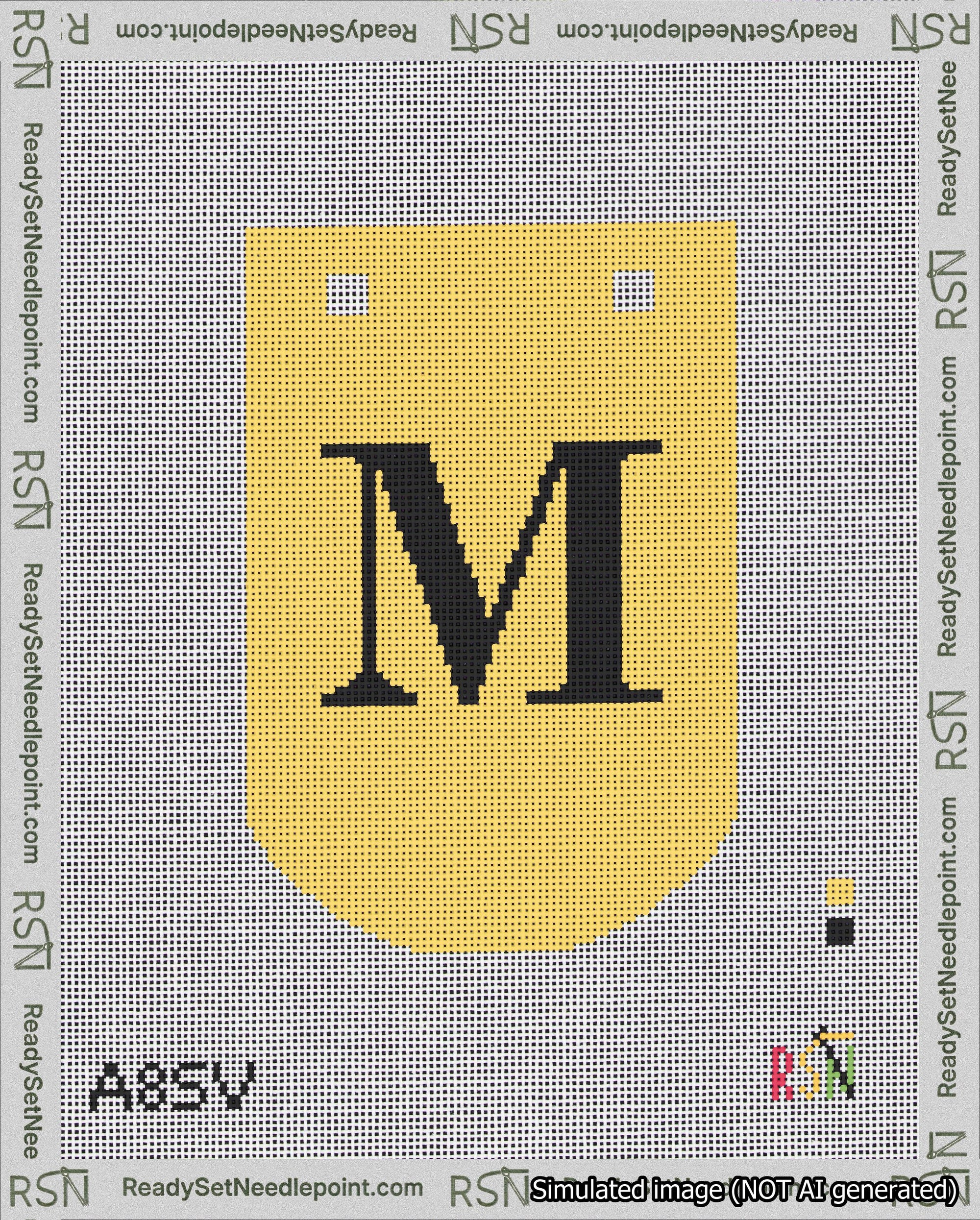 A taped needlepoint canvas with the design: Banner 18 mesh count Curved M Black on Yellow.