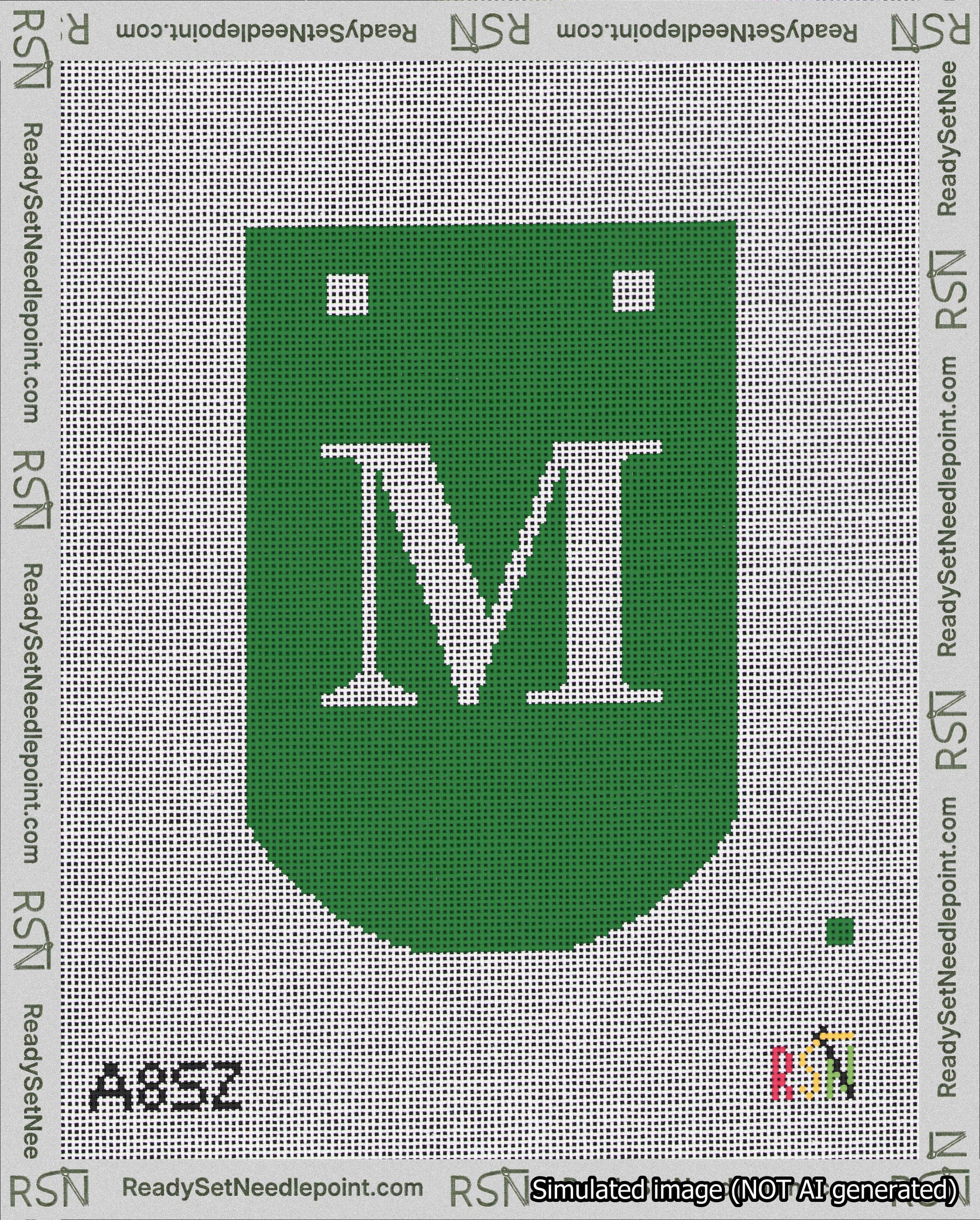 A taped needlepoint canvas with the design: Banner 18 mesh count Curved M White on Green.