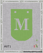 A taped needlepoint canvas with the design: Banner 18 mesh count Curved M White on Light Green.