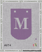 A taped needlepoint canvas with the design: Banner 18 mesh count Curved M White on Purple.