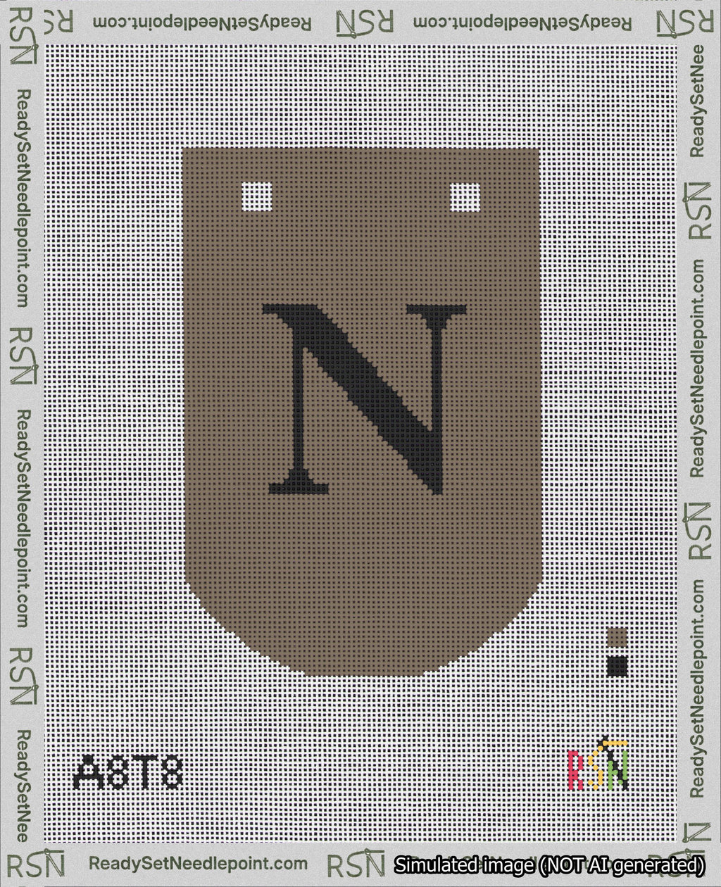 A taped needlepoint canvas with the design: Banner 18 mesh count Curved N Black on Brown.