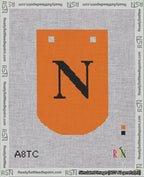 A taped needlepoint canvas with the design: Banner 18 mesh count Curved N Black on Orange.
