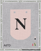 A taped needlepoint canvas with the design: Banner 18 mesh count Curved N Black on Pink.