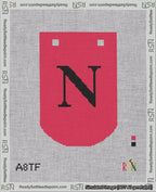 A taped needlepoint canvas with the design: Banner 18 mesh count Curved N Black on Red.
