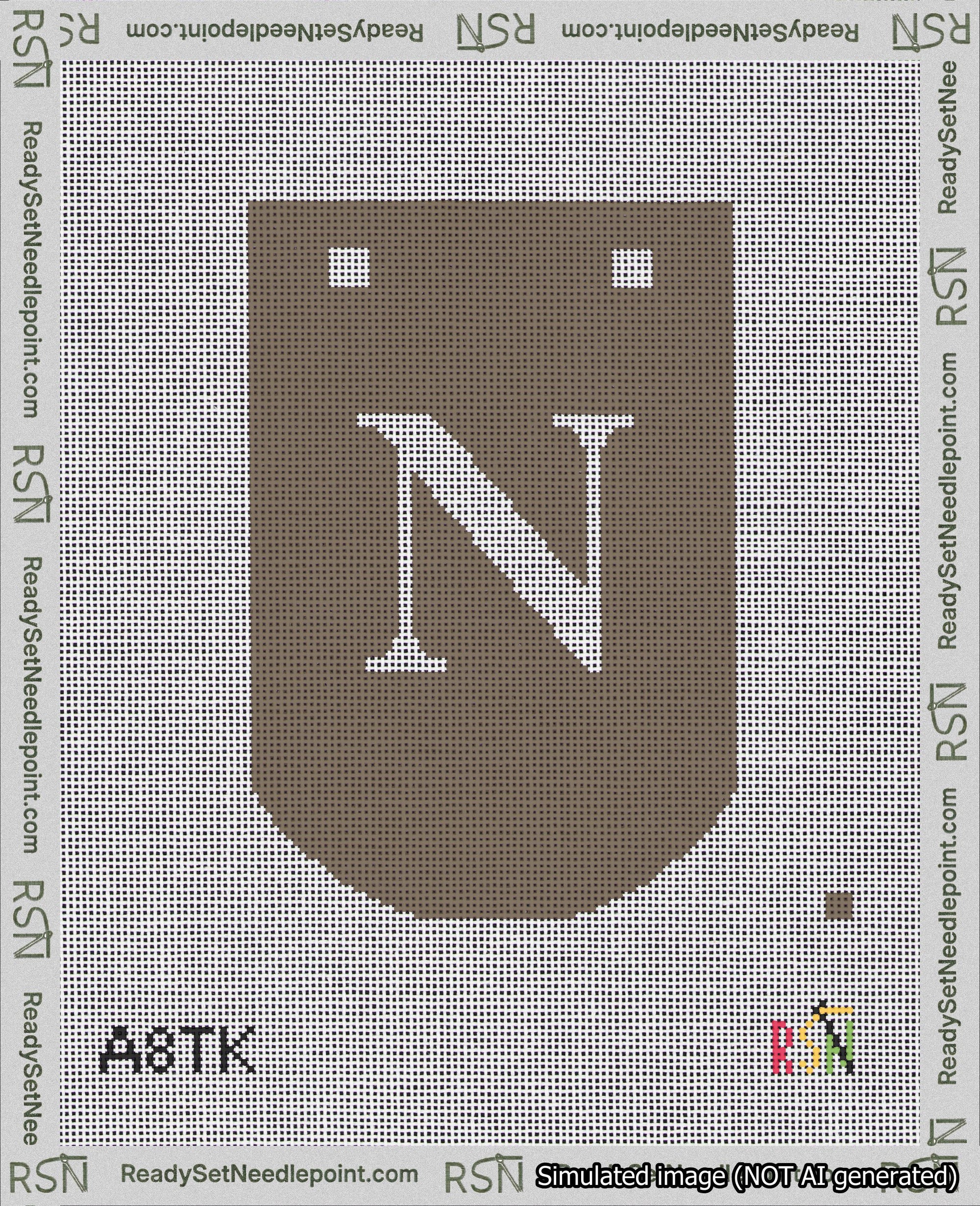 A taped needlepoint canvas with the design: Banner 18 mesh count Curved N White on Brown.