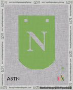 A taped needlepoint canvas with the design: Banner 18 mesh count Curved N White on Light Green.