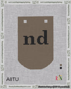 A taped needlepoint canvas with the design: Banner 18 mesh count Curved nd Black on Brown.