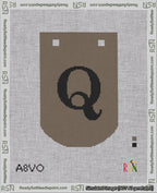 A taped needlepoint canvas with the design: Banner 18 mesh count Curved Q Black on Brown.