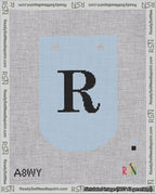 A taped needlepoint canvas with the design: Banner 18 mesh count Curved R Black on Light Blue.