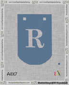 A taped needlepoint canvas with the design: Banner 18 mesh count Curved R White on Blue.