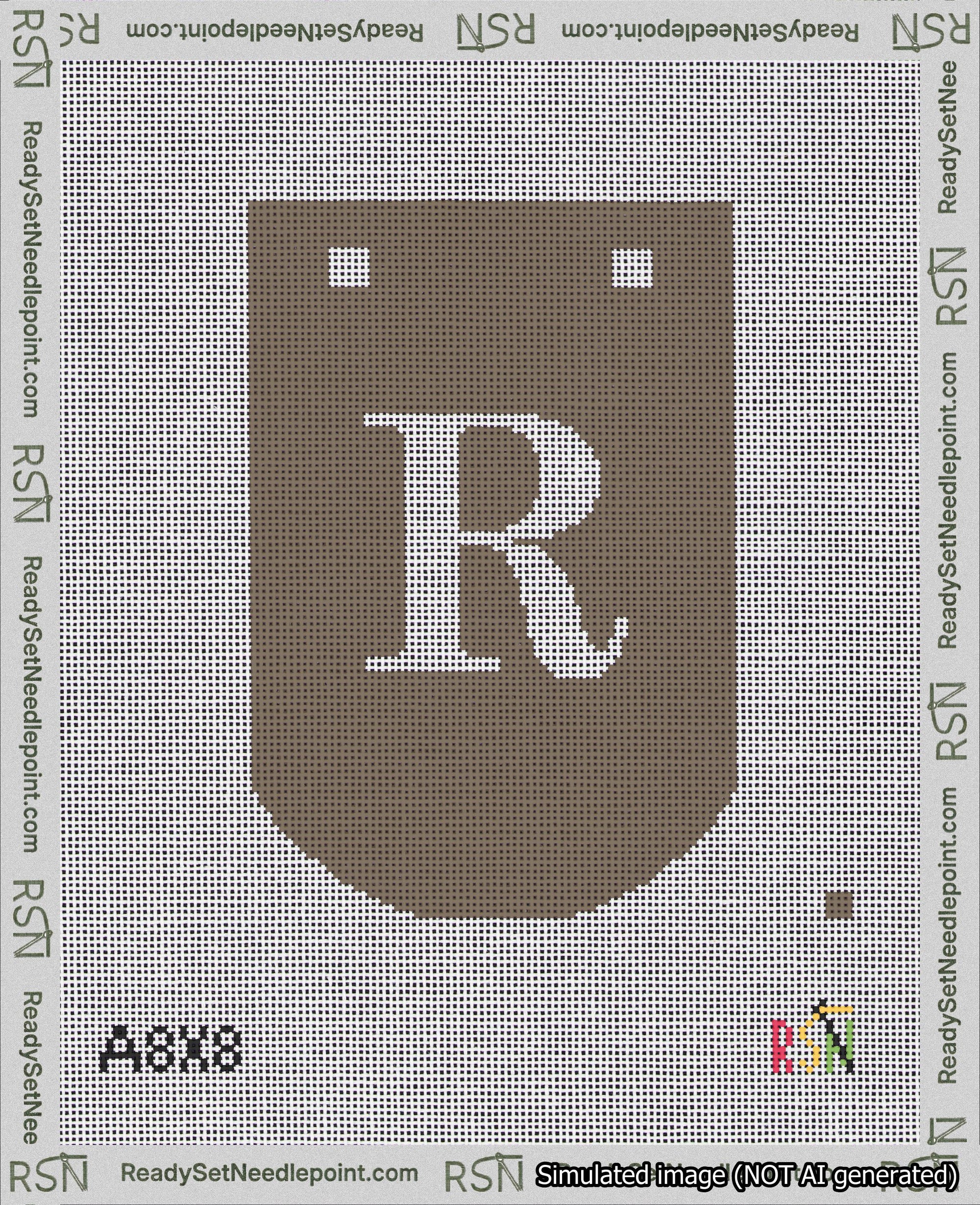 A taped needlepoint canvas with the design: Banner 18 mesh count Curved R White on Brown.