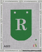 A taped needlepoint canvas with the design: Banner 18 mesh count Curved R White on Green.