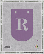 A taped needlepoint canvas with the design: Banner 18 mesh count Curved R White on Purple.