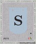 A taped needlepoint canvas with the design: Banner 18 mesh count Curved S Black on Light Blue.