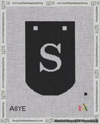 A taped needlepoint canvas with the design: Banner 18 mesh count Curved S White on Black.
